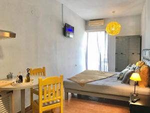 Postel nebo postele na pokoji v ubytování Eleana Apartments