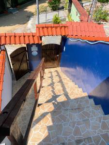 Bazén v ubytování Suites Casa Azul-Vila do Abraão- conforto, limpeza, ótima localização nebo v jeho okolí