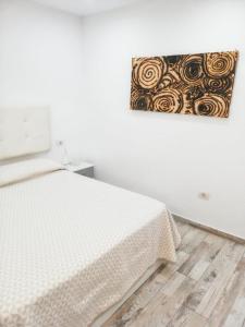 Postel nebo postele na pokoji v ubytování Charming apartment near Costa Adeje with pool