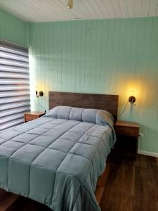 Postel nebo postele na pokoji v ubytování Hostal Angy