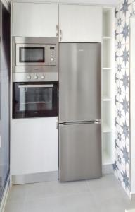 Kuchyň nebo kuchyňský kout v ubytování Comfortable Apartment in Arona, 50 m², Shared Pool