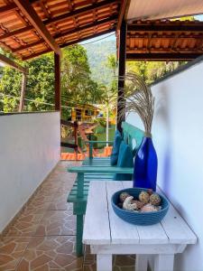 Balkón nebo terasa v ubytování Suites Casa Azul-Vila do Abraão- conforto, limpeza, ótima localização
