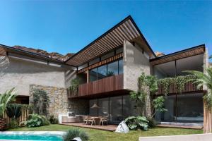 an exterior view of a house with a pool at Casa Carpe Eco-Luxury Vichayito in Vichayito