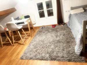 Posteľ alebo postele v izbe v ubytovaní Maison chaleureuse à Saint-Juéry avec jardin