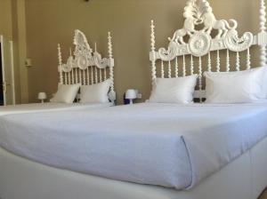 A bed or beds in a room at Royal Porto City