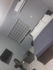 TV a/nebo společenská místnost v ubytování VW Hotel