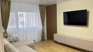 TV/trung tâm giải trí tại Lina&Adi