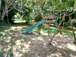 Detský kútik v ubytovaní Maison familiale avec jardin - Plougonvelin + 4 fotografie