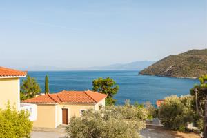a house with a view of the ocean at Villa Platanaki in Kerveli