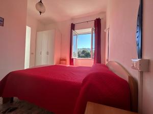 Ένα ή περισσότερα κρεβάτια σε δωμάτιο στο Villa dei Sogni - Aparthotel Ischia Ponte