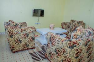 TV a/nebo společenská místnost v ubytování Lyntex guest house