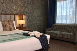 Letto o letti in una camera di Amber Springs Hotel