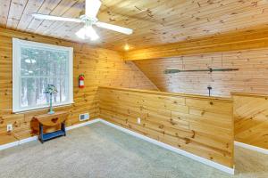 a large room with wooden walls and a ceiling at Less Than 1 Mi to ATV Trails Cadillac Golf Retreat! in Cadillac +25 photos