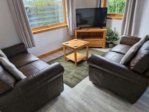 TV a/nebo společenská místnost v ubytování Kings Reach - Dunadd Cottage