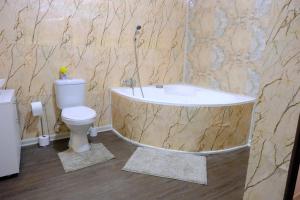 Et badeværelse på Distinctive resort + 4 billeder