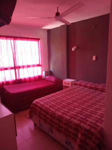 Postel nebo postele na pokoji v ubytování Costa del Sol