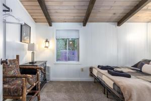 a bedroom with two beds and a window at Glacier Peak Getaway | Wifi, Fireplace, Lower Timb in Packwood