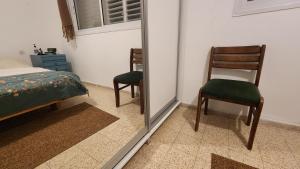 Postel nebo postele na pokoji v ubytování Jaffa Waves
