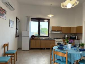 Η κουζίνα ή μικρή κουζίνα στο Casa Atena