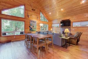 a living room with a couch and a table at Elk House in Packwood