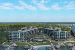 an aerial view of a resort with a marina at Phoenix on the Bay 1514 in Orange Beach