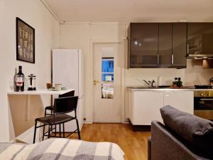 Köök või kööginurk majutusasutuses Cozy condo near Bryggen Full kitchen Elevator +32 fotot