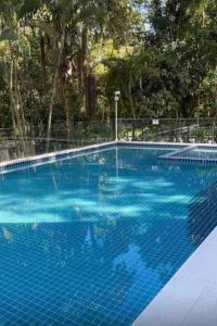 La alberca dentro o cerca de Riviera de São Lourenço condomínio