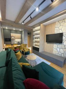 TV a/nebo společenská místnost v ubytování Apartman Royal Luxury Lara