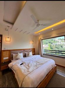 Voodi või voodid majutusasutuse The Boho Mussoorie toas