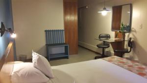 Кровать или кровати в номере Hotel Amalfi