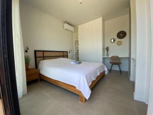 Postel nebo postele na pokoji v ubytování Villa Ilios