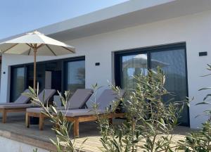 Patio nebo venkovní prostory v ubytování Villa Ilios
