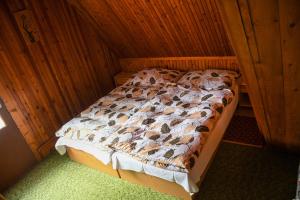 Postel nebo postele na pokoji v ubytování Chata Slávka