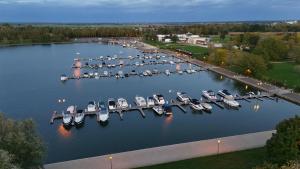 an aerial view of a marina with boats docked at L'Hermione in Dienville