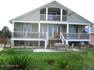 una grande casa con portico e patio di The Chautauqua Gorgeous Direct OCEANFRONT Home 3 Decks Pool Table - Amazing Views a Saint Augustine Beach