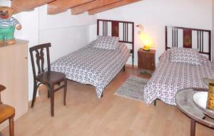 Postel nebo postele na pokoji v ubytování Modern Apartment in Tolva with Garden and Sports Facilities