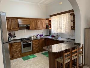 Kuchyň nebo kuchyňský kout v ubytování Cloud 9 Residence