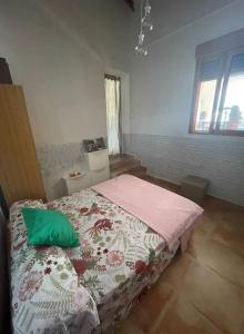 Postel nebo postele na pokoji v ubytování Cortijo de la montaña + 12 fotografií