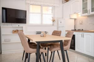 Kuchyňa alebo kuchynka v ubytovaní Apartments Mar