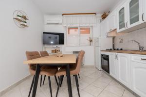 Kuchyňa alebo kuchynka v ubytovaní Apartments Mar