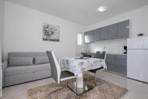 Kuchyňa alebo kuchynka v ubytovaní Apartments Mar