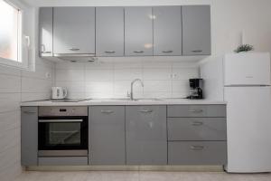 Kuchyňa alebo kuchynka v ubytovaní Apartments Mar