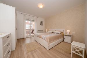 Posteľ alebo postele v izbe v ubytovaní Apartments Mar