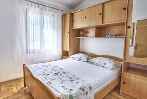 Posteľ alebo postele v izbe v ubytovaní Apartments Branka