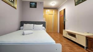 Postel nebo postele na pokoji v ubytování Amazing view Apartment at Kemayoran JIEXPO -Min Stay 3 nights-