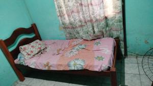 Postel nebo postele na pokoji v ubytování Hospedagem Casa grande