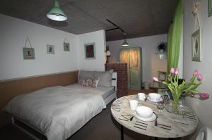 Posteľ alebo postele v izbe v ubytovaní Apartmány u Bašty