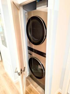 two microwaves in a room with a door at My Cozy Beach House Cape May Court House NJ Pool Near Wildwood and Cape May in Whitesboro