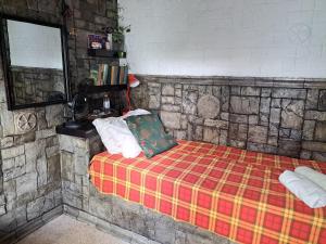 Postel nebo postele na pokoji v ubytování Casa Jazz