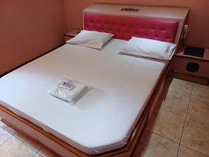 Postel nebo postele na pokoji v ubytování Hotel Fascinação